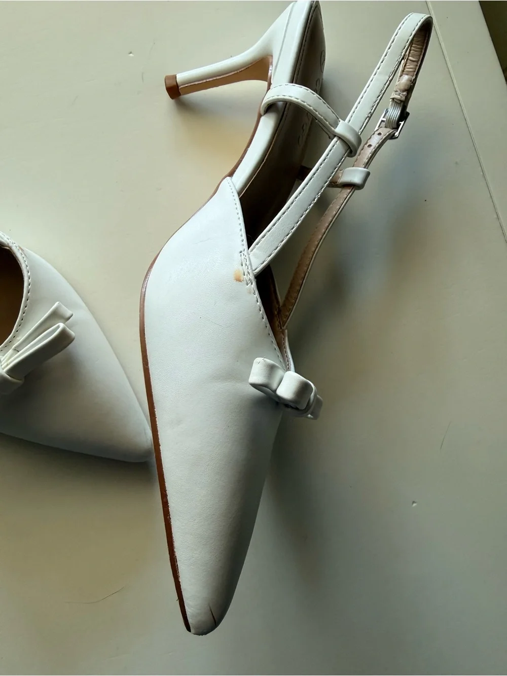 White Pointed Slingback Heels with Bow Accent